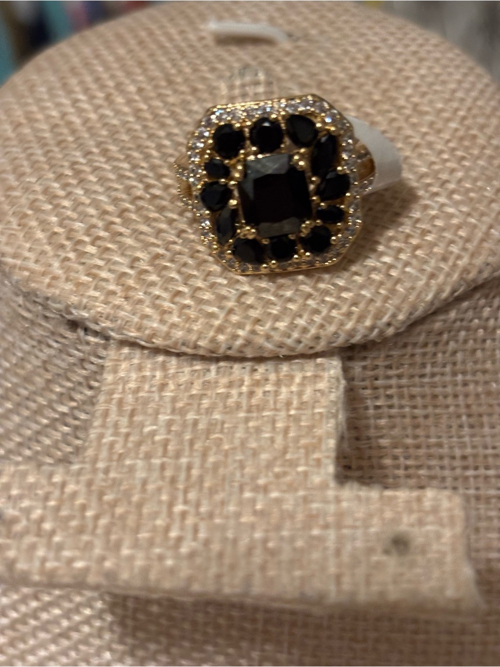 Gold- tone Ring with Black Gemstone Accents